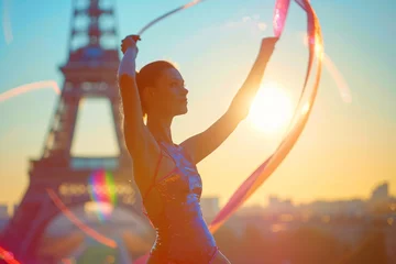 Fototapeten Beautiful girl gymnast with ribbon on the background Paris © mihail
