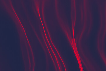 An abstract 3D render featuring elegant, smooth waves that resemble luxurious silk background, with neon particles and a futuristic glow