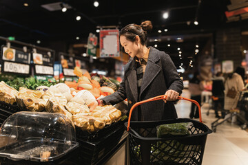 Young Woman Selecting Fresh Produce at Market
