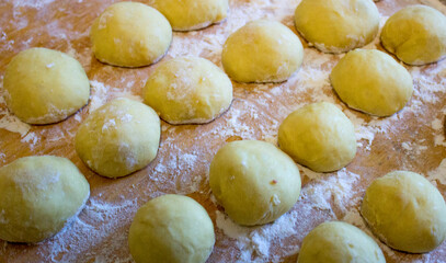 Delicious donuts are made by hand in the kitchen
