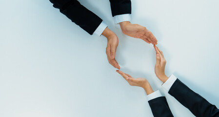 Business people collaborate business synergy and cooperation, join hand as frame around empty blank...