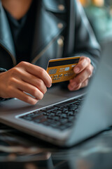 Making a purchase in an online store using a laptop with a credit card