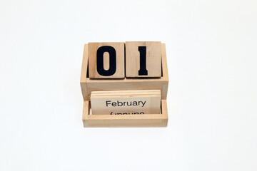 1st of February wooden perpetual calendar. Shot close up isolated on a white background 