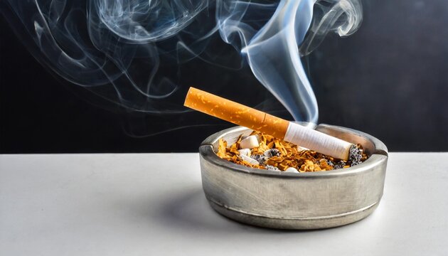 cigarette in ashtray on white background smoking concept