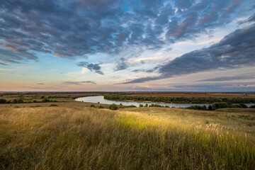 Obraz premium Magical autumn landscape with river and sunset sky