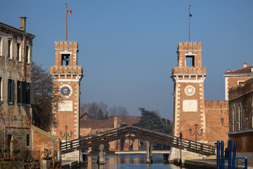Entrance in the Arsenale di Venezia is a historic shipyard in the lagoon city of Venice, Veneto,...