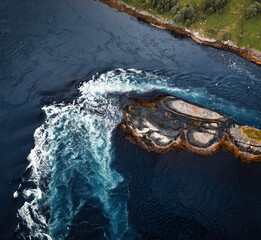 Whirlpool and splash in Saltstraumen, a small strait in Norway with one of the strongest tidal...