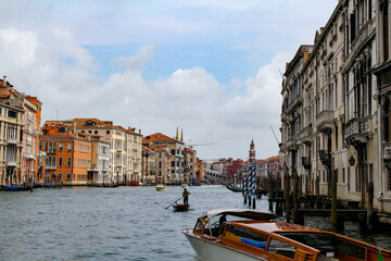 A Gondola Ride in Venice. Gondoliers On the Grand Canal. Venice Travel - obrazy, fototapety, plakaty