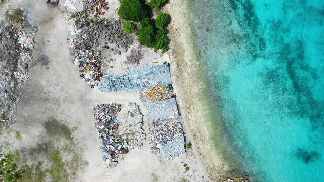 Aerial view of pollution problem by rubbish in Maldives. Toxic dump near Mali city