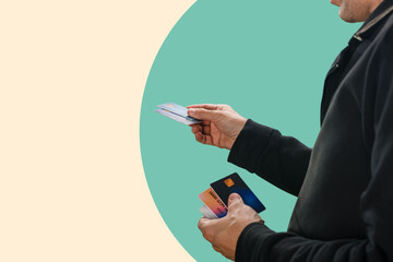 Male customer giving credit card to make contactless payment, Cardholder's array: Man's hands present a diverse collection of payment cards in close-up