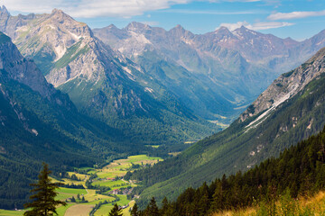 A beautiful alpine valley lit by the sun. Gschnitztal valley in summer, Tyrol, Austria.