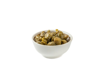 Capers in a bowl isolated on a white background. Marinated caper buds, small salted capparis in bowl, fermented food, pickled capers group.Organic spices and seasonings.