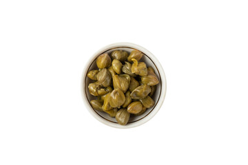 Capers in a bowl isolated on a white background. Marinated caper buds, small salted capparis in bowl, fermented food, pickled capers group.Organic spices and seasonings.