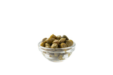 Capers in a bowl isolated on a white background. Marinated caper buds, small salted capparis in bowl, fermented food, pickled capers group.Organic spices and seasonings.