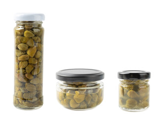 Capers in a glass jar isolated on a white background. Marinated caper buds, small salted capparis in bowl, fermented food, pickled capers group.Organic spices and seasonings.