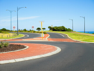 Roundabout and speed limit signs