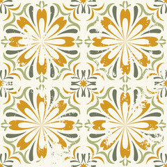 The classic design of ceramic tiles with floral and leaf elements. Shades of green and yellow. Inspired by Mexican floral mosaic and Mediterranean aesthetics. Textured retro tiles.