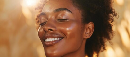 Black woman with glowing, healthy skin happy about skincare and cosmetic treatments for a refreshed and youthful appearance.