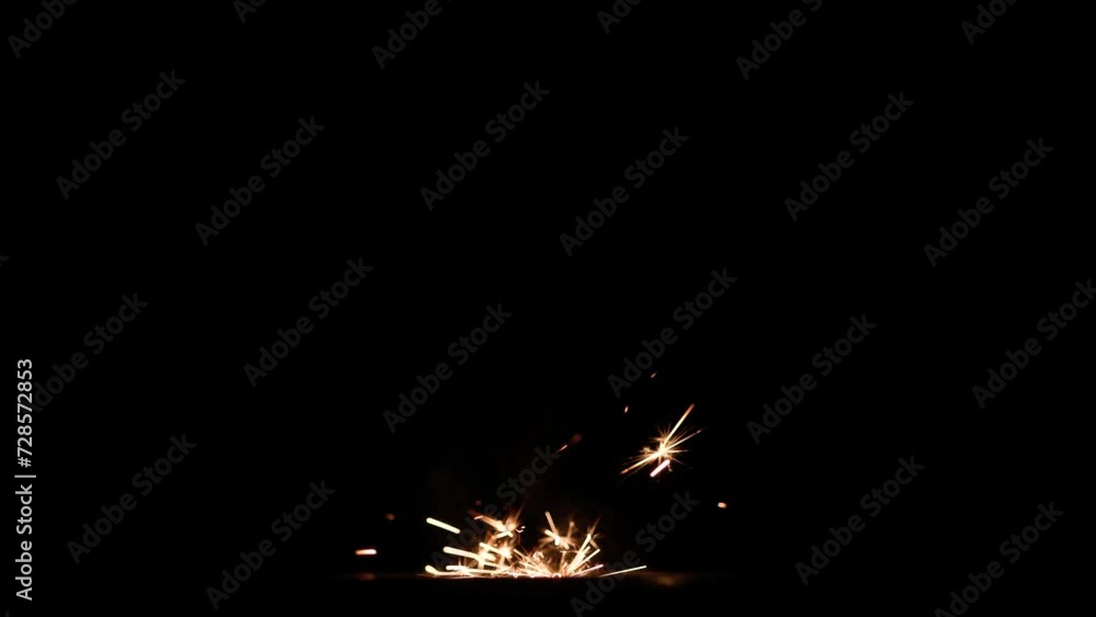 Poster Fireworks bengal Flicker on a dark background. Easy to add lens flare effects for overlay designs or screen blending mode to make high-quality images.