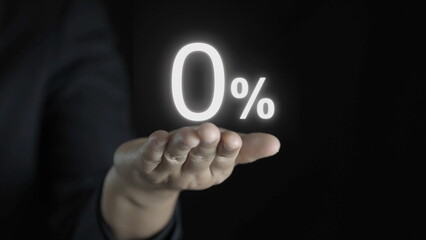 Businessman holding zero percentage on hand with copy space for sale discount promotion for Black Friday and merry Christmas happy new year period.