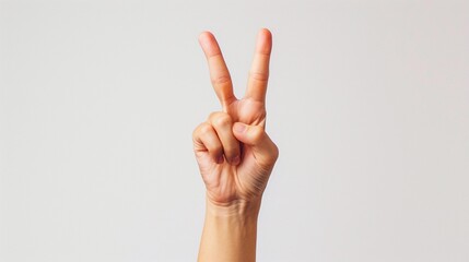 Close-up of hand raising two fingers victory symbol on white background, background image, generative AI