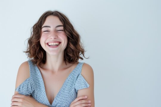 Woman Smiling With Crossed Arms