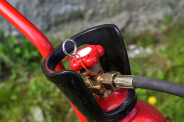 Close-up of a fire extinguisher valve.