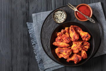 spicy crispy grilled chicken wings, top view