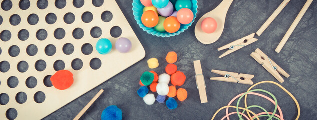 Different accessories using for playing and development of kids motor skills, coordination and logical thinking