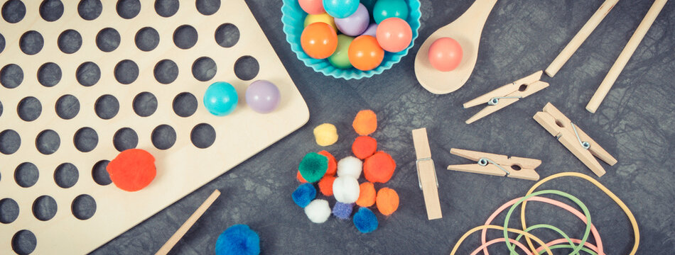 Different accessories using for playing and development of kids motor skills, coordination and logical thinking