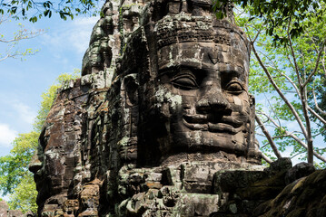Fototapeta na wymiar City gate guard in the Cambodian temple city of Angkor Wat