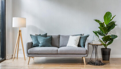 grey sofa and lamp in white living room,