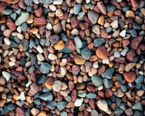 Downward view of multi-color crushed stone gravel, and pebbles