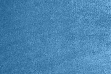 Light Blue Smooth Polar Fleece Fabric with Delicate Pile. Layout with Denim Blue Artificial Fur....