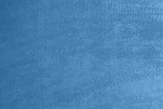 Light Blue Smooth Polar Fleece Fabric with Delicate Pile. Layout with Denim Blue Artificial Fur. Background with Texture of Fleece.Monochrome Delicate Plush.