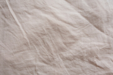 Rough Natural Beige Fabric. Textured Background of Pleated Cotton Fabric with Visible Material...