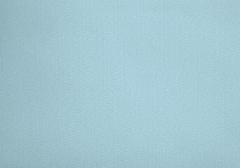 Light Blue Paper with a Delicate Embossed Surface. Pastel Blue Clear Decorative Cardboard. Paper Texture. No text. Textured Rough Paper Layout. Elegant Paper Sheet with soft Structure.