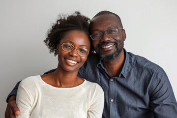 Smiling Man and Woman Looking at the Camera