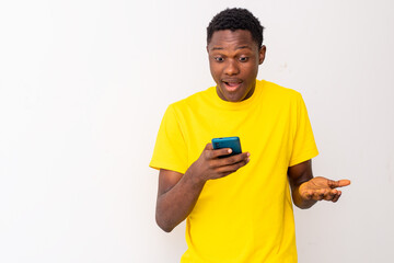 excited young black man checking his smartphone