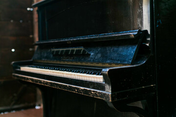 Fototapeta na wymiar dusty old piano keyboard