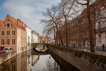 Fototapeta premium Beautiful houses along the canals of Brugge, Belgium. Tourism destination in Europe