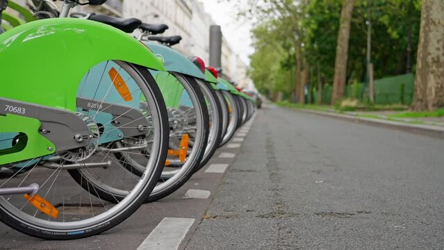 France, Row of available bikes at a Velib rental station. bike rental in Paris