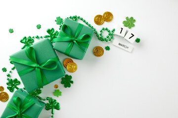 Irish elegance in every box: St. Paddy's Day gift suggestions. Top view shot of cube calendar, gift...