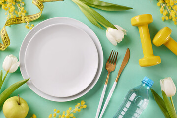 Іpring shed: crafting a seasonal weight loss plan. Top view shot of plates, cutlery, apple, water...