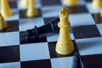 Chess pieces on a chessboard closeup selective focus