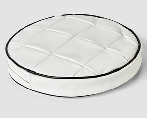 Round cushion in white patchwork leather with contrasting black trim