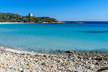 Cala Pira beach and tower, with white sand and crystal clear water. Castiadas, Sardinia, Italy