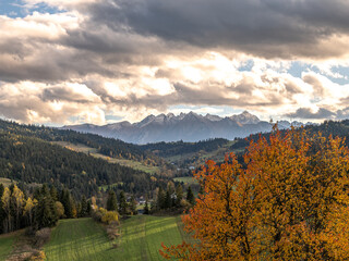 view of the mountains from another mountain in autumn	