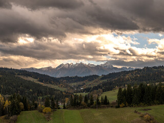view of the mountains from another mountain in autumn	