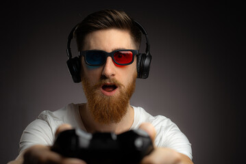 Photo of excited funky man wear t-shirt enjoying playstation game